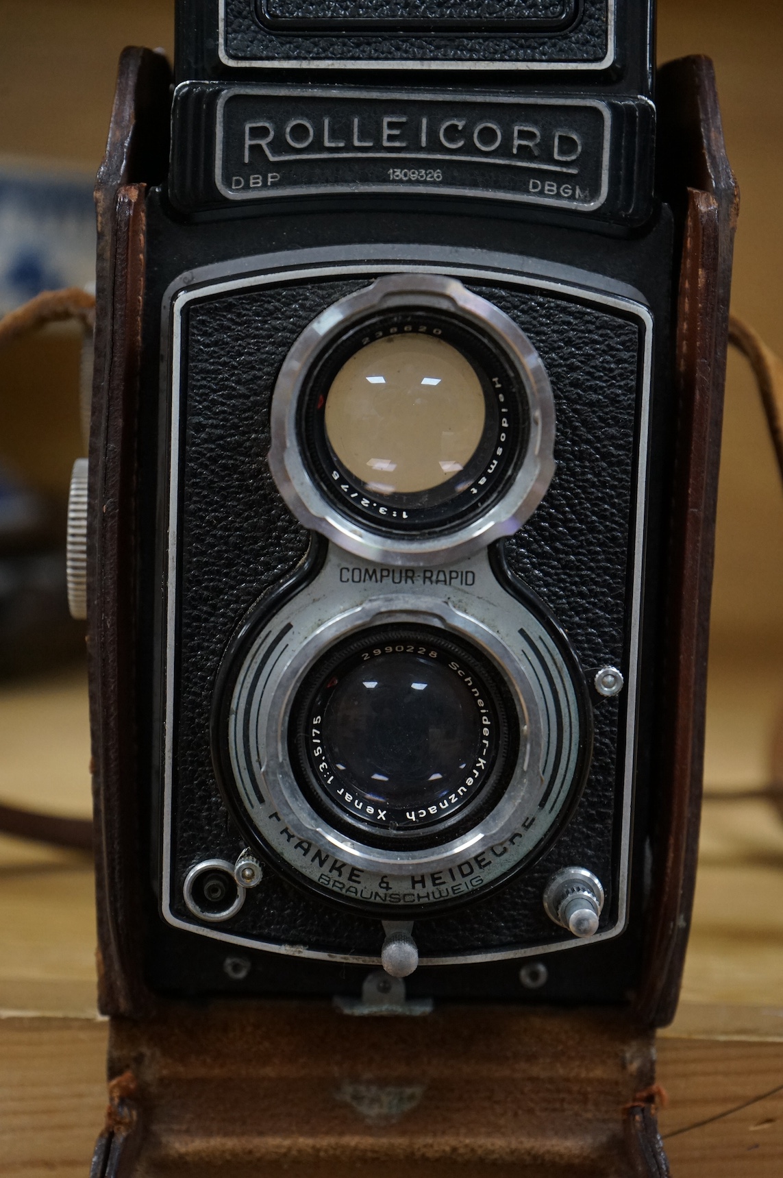 A vintage Rolleicord TLR camera, cased.